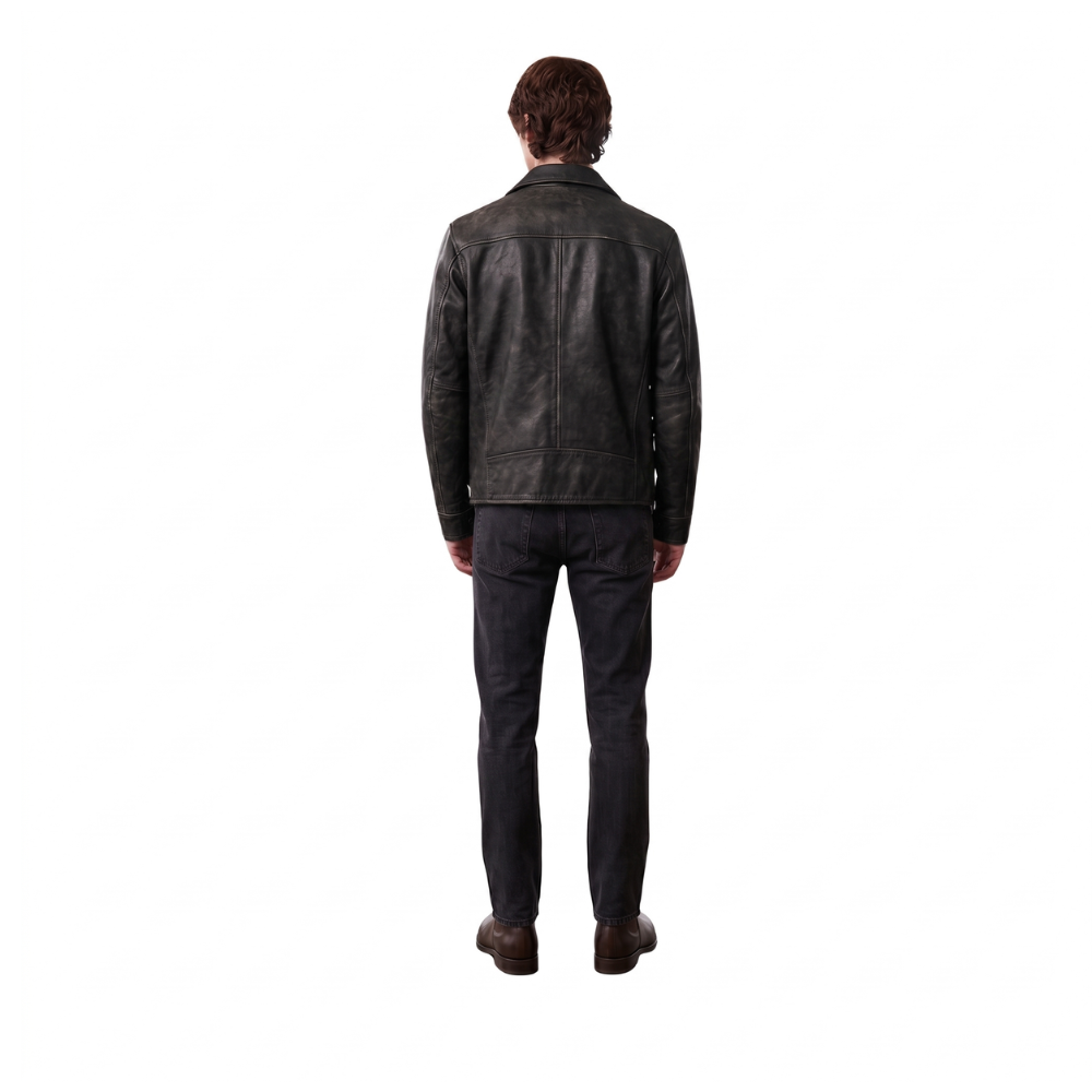 Man wearing black leather jacket and dark jeans, back view