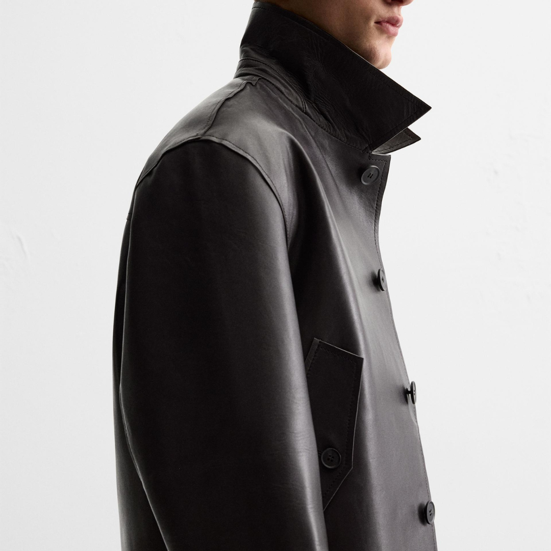 Men's black leather trench coat with high collar and button front, stylish outerwear for modern fashion