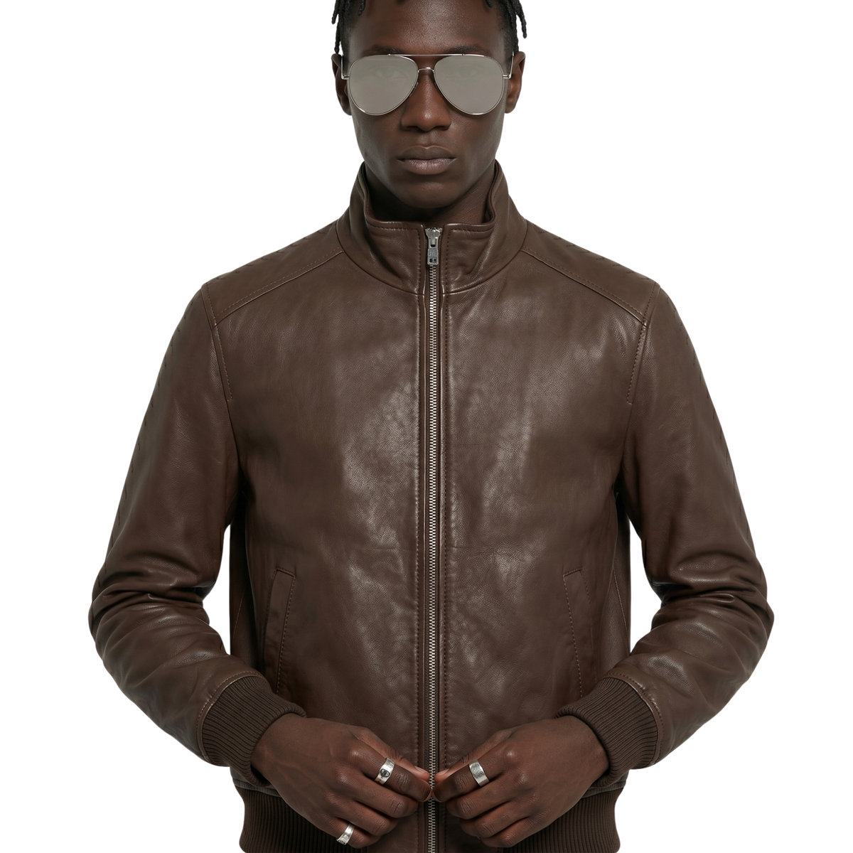 Brown leather bomber jacket with zipper and ribbed cuffs, styled with aviator sunglasses