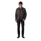 Men's dark brown leather jacket with zipper pockets, paired with black jeans and boots