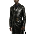 Black leather trench coat with belt, worn over formal shirt and tie, stylish men's outerwear
