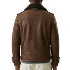 Brown leather jacket with shearling collar and zipper pockets, back view