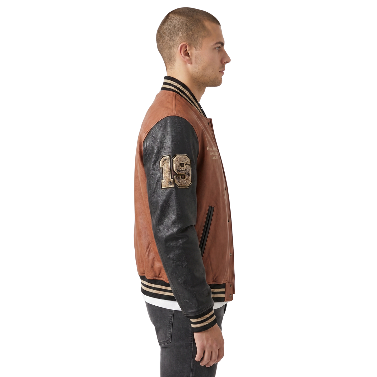 Men's brown and black leather varsity jacket with number 19 on sleeve, side view