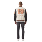 Men's varsity jacket with '19' and 'Same Old Shore' back print, leather sleeves, cream body, striped trim