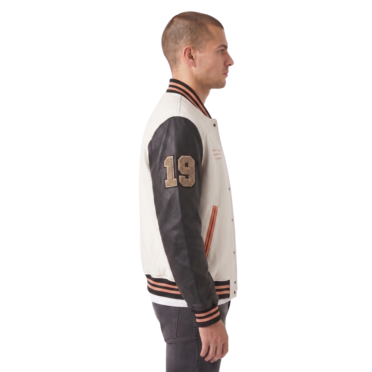 Men's varsity jacket with leather sleeves, number 19, and striped trim, side view