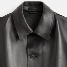 Black leather jacket with classic collar and button closure, sleek design for men