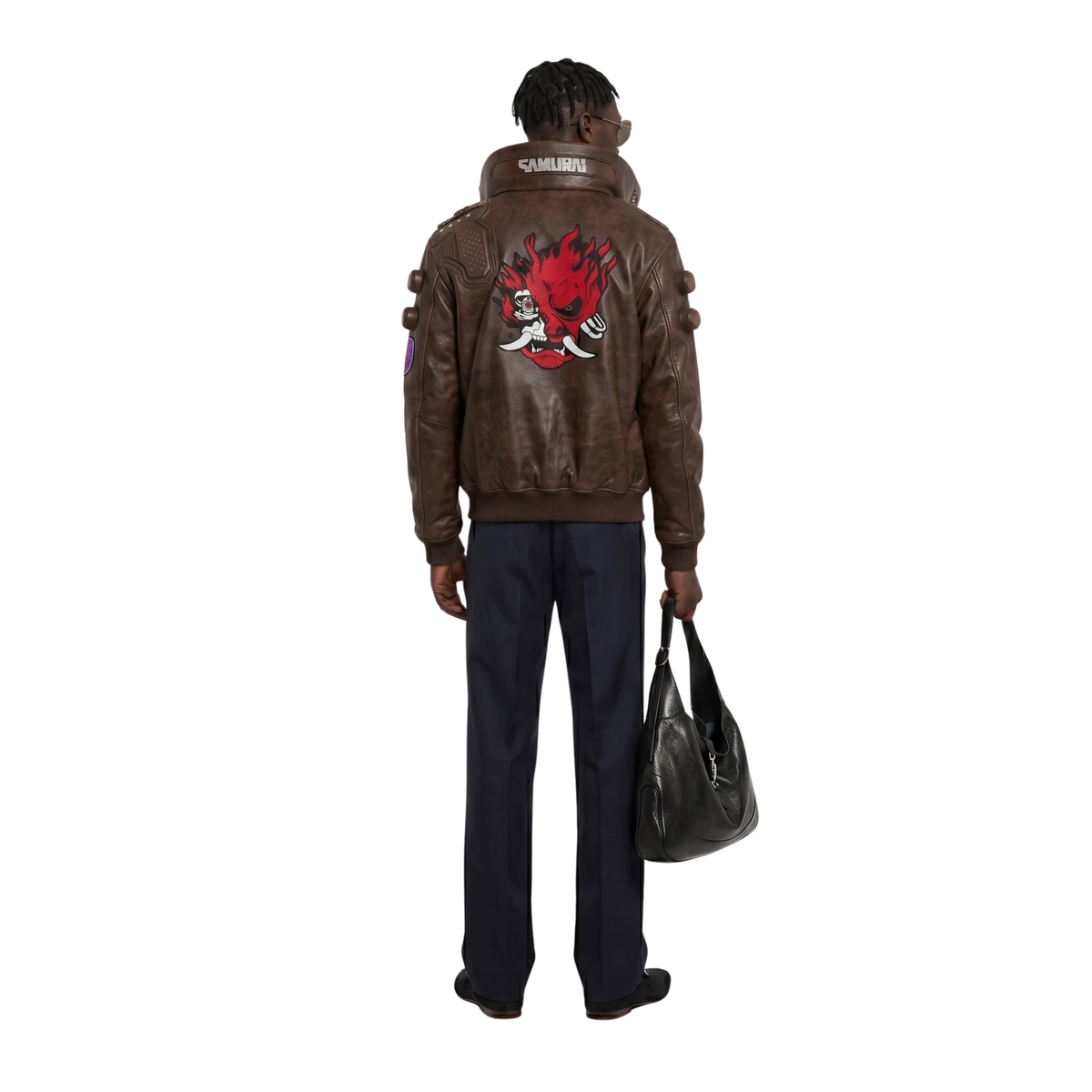 Brown leather bomber jacket with red samurai mask graphic, SAMURAI text on collar, and shoulder pads