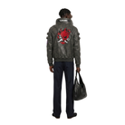 Gray leather jacket with red flame skull design, worn with navy pants and black bag