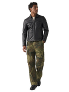 Man wearing black leather jacket and camouflage cargo pants, stylish outdoor outfit