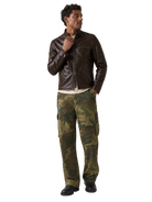 Man wearing brown leather jacket and camouflage cargo pants for stylish outdoor look