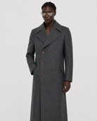 Men's charcoal grey double-breasted wool coat with brown buttons, styled with aviator sunglasses