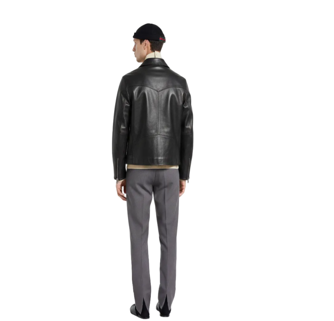 Men's black leather jacket with gray trousers, back view, stylish casual outfit