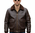 Men's brown leather bomber jacket with shearling collar and front pockets