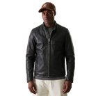 Men's black leather jacket with front zipper and side pockets, styled with cap and casual pants