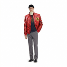 Red leather bomber jacket with Cobra Kai patch, worn with turtleneck, gray pants, and black beanie