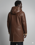 Brown hooded leather coat with shearling lining, back view on model