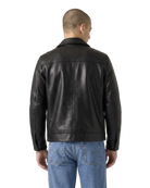 Men's black leather jacket back view with classic stitching, paired with blue jeans for casual style.