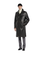 Men's black leather trench coat with classic collar and front buttons, styled with turtleneck and gray trousers