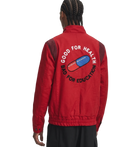 Red bomber jacket with 'Good for Health Bad for Education' graphic and pill design on back