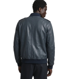 Men's dark leather bomber jacket with ribbed collar and cuffs, back view