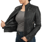 Woman modeling black leather moto jacket with zipper details and gray top